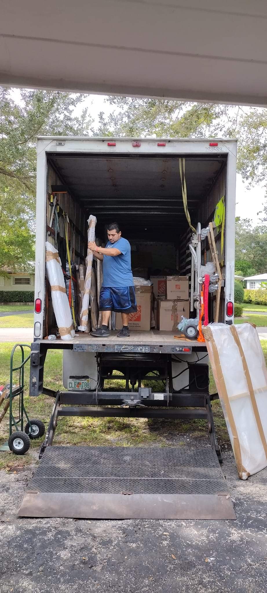 Door to Door Shipping Services crew with a moving truck in Miami