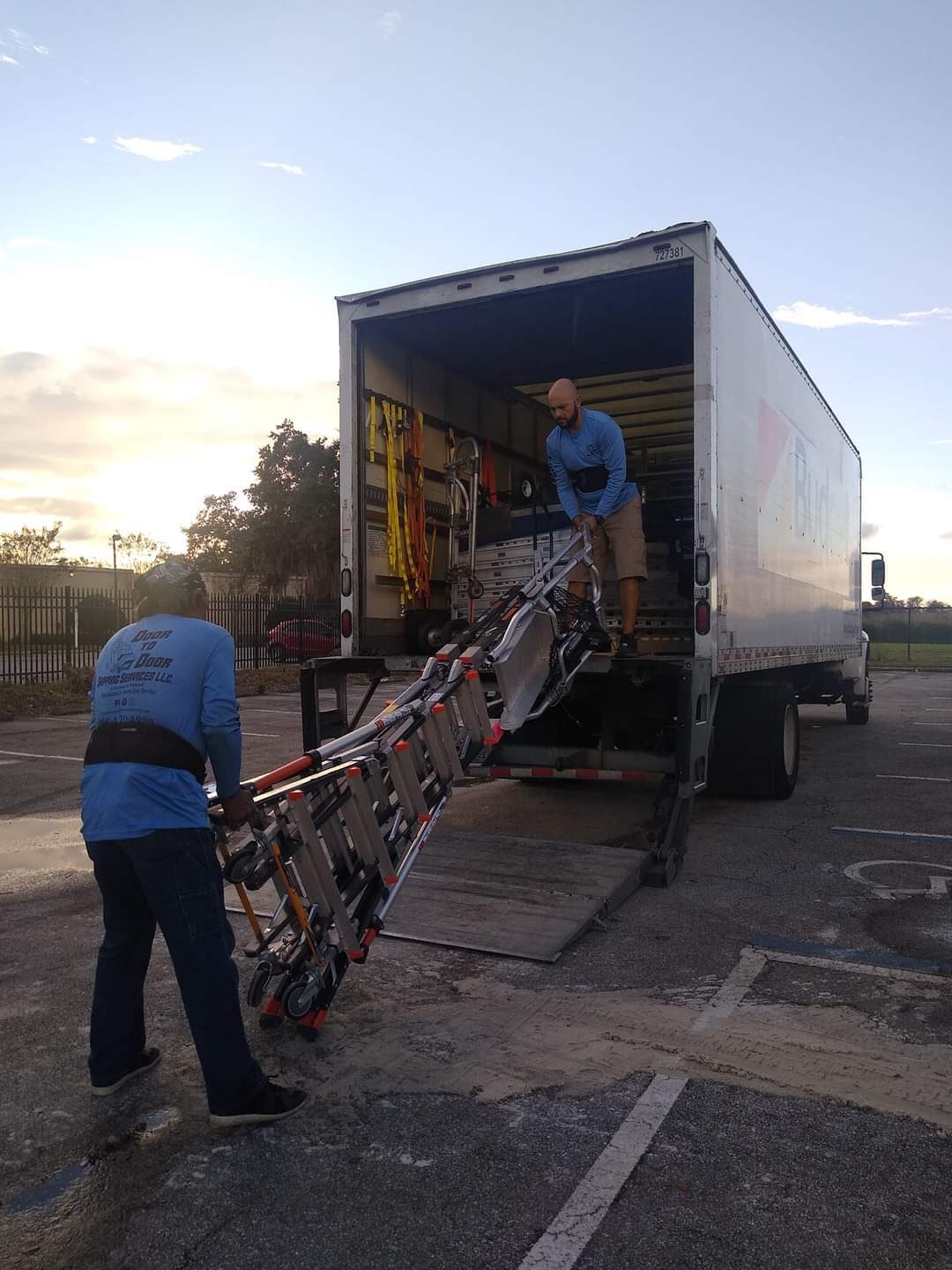 Local residential movers wrapping furniture